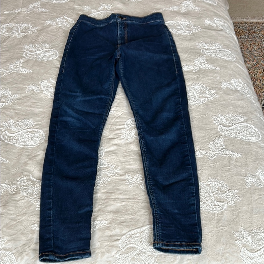 Topshop high waisted skinny jeans with flat front and back pockets.